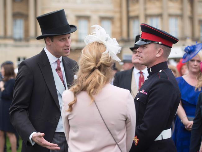 Britain’s Prince William, Duke of Cambridge, greets guests at a garden party at Buckingham Palace in London on May 16, 2017. Picture: AFP
