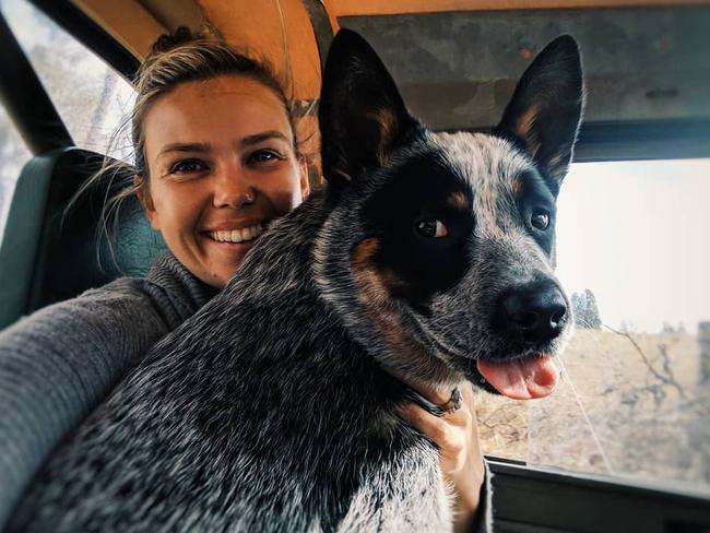 Edwina Bartholomew on her farm with the family’s Blue Heeler. Picture: Instagram