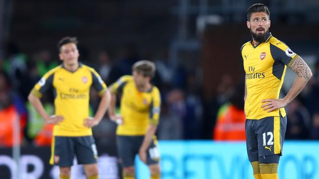 Olivier Giroud of Arsenal (12) looks dejected.