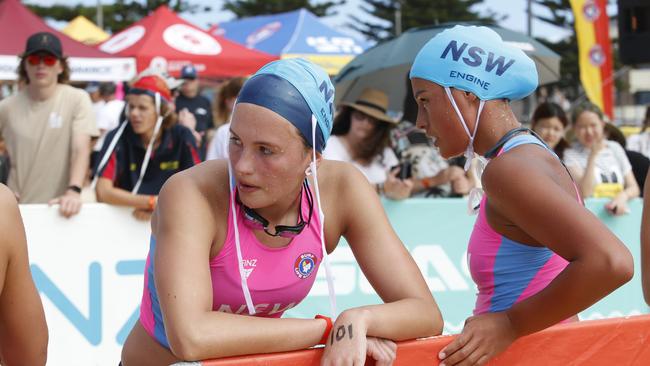 L to R: Zara Kasprowicz and Pipi Te Pania catch their breath after placing 3rd and second respectively in the pathway iron race.