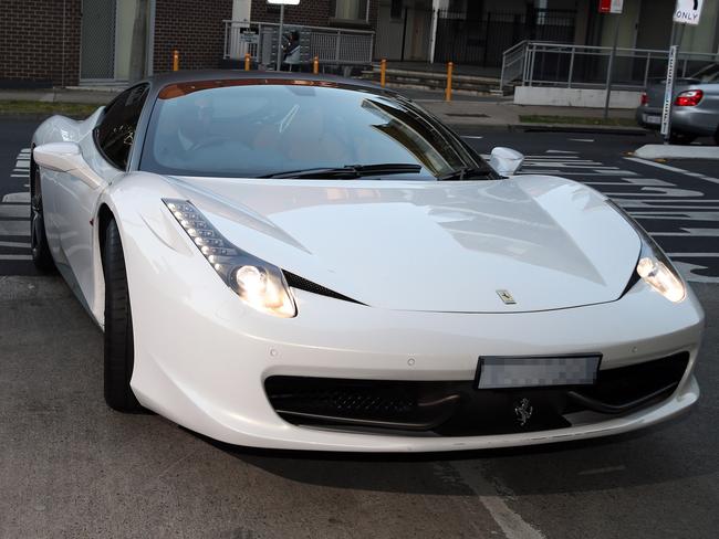 Salim Mehajer arrives for an Auburn Council meeting in his Ferrari. Picture: Andrew Murray