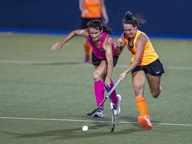 Sue Marcussen, Rebels and Briana Suey, Vixens. Ruhles Rebels vs CS The Vixens, Club Glenvale Hockey. Friday. 12th Feb 2021 Picture: Nev Madsen