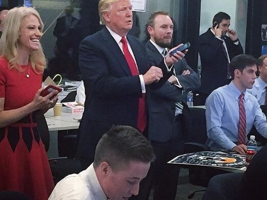 Cliff Sims (arms crossed) with Donald Trump and Kellyanne Conway. Picture: Twitter