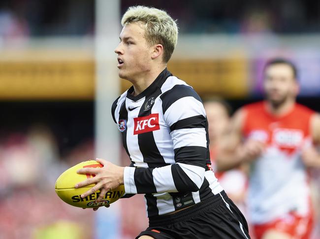 SYDNEY, AUSTRALIA - AUGUST 14: Jack Ginnivan of the Magpies controls the ball during the round 22 AFL match between the Sydney Swans and the Collingwood Magpies at Sydney Cricket Ground on August 14, 2022 in Sydney, Australia. (Photo by Brett Hemmings/AFL Photos/via Getty Images )