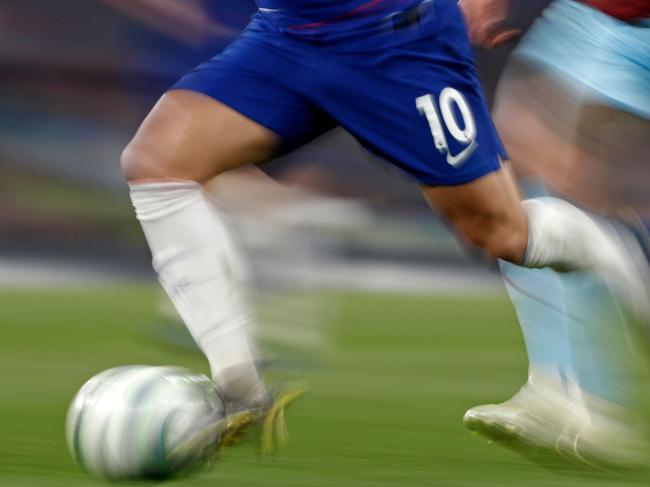 (FILES) In this file photo taken on April 22, 2019 Chelsea's Belgian midfielder Eden Hazard (L) runs way from Burnley's Irish midfielder Jeff Hendrick (R) during the English Premier League football match between Chelsea and Burnley at Stamford Bridge in London on April 22, 2019. (Photo by Adrian DENNIS / AFP) / RESTRICTED TO EDITORIAL USE. No use with unauthorized audio, video, data, fixture lists, club/league logos or 'live' services. Online in-match use limited to 120 images. An additional 40 images may be used in extra time. No video emulation. Social media in-match use limited to 120 images. An additional 40 images may be used in extra time. No use in betting publications, games or single club/league/player publications. /