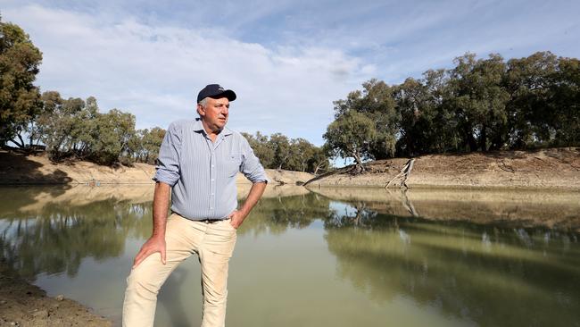 Robert McBride on the banks of the Darling River at Tolarno Station south of Menindee.