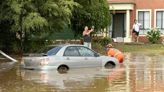 A car submerged in water after the main burst. Picture: Bianca De Marchi