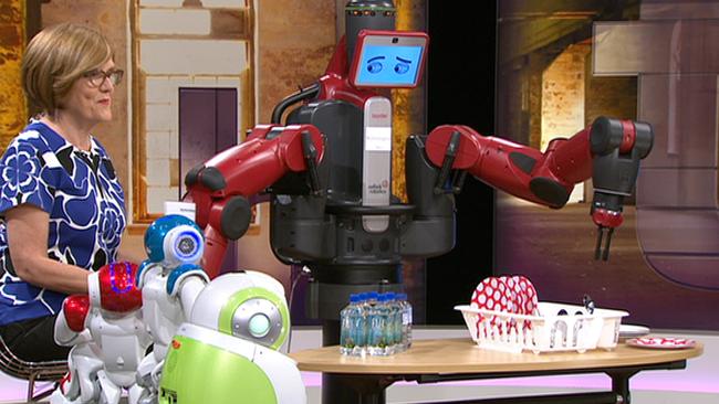 Insight host Jenny Brockie with robots. Picture: SBS.