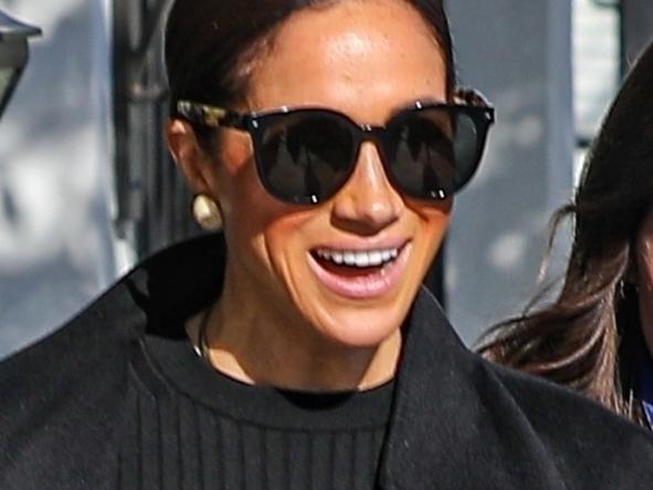 *PREMIUM-EXCLUSIVE* ONE TIME USE ONLY AU_2588762 - West Hollywood, CA  -  *PREMIUM-EXCLUSIVE*  - Meghan Markle was all smiles as she left Gracias Madre in West Hollywood after an International Women's Day celebration. The Duchess of Sussex steppe out in a chic all black look with a Chanel handbag and Valentino slides and a megawatt smile amid news her children would get to keep their royal titles.  Pictured: Meghan Markle  BACKGRID Australia 9 MARCH 2023   BYLINE MUST READ: MEGA / BACKGRID  Phone: + 61 419 847 429 Email:  sarah@backgrid.com.au