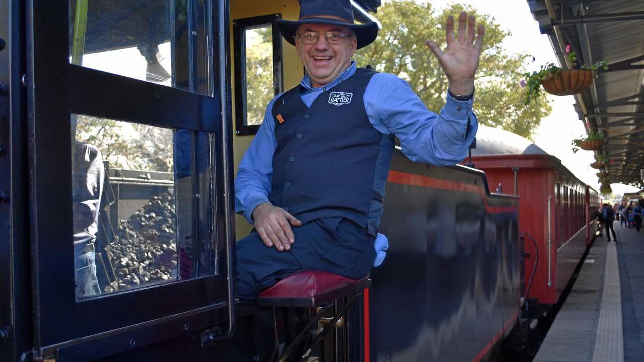 Fireman Darrell McCulloch waves goodbye at the start of the run at the Rattler Double Steam Day on Saturday. Picture: Arthur Gorrie