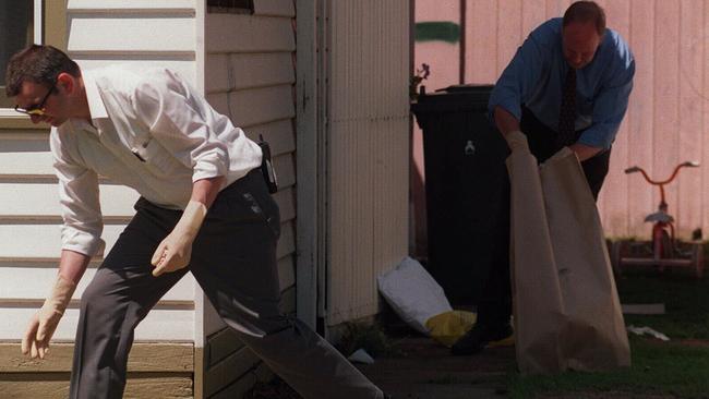 Police collecting evidence at the Niddrie scene in 1997.