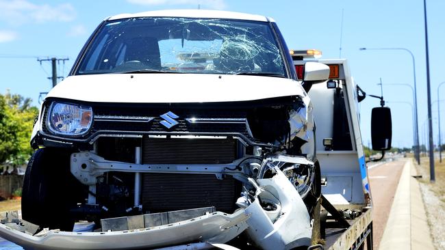 Traffic along University Drive, Annandale was brought to a standstill after a two vehicle crash ended with a car on its side. Picture: KATE BANVILLE