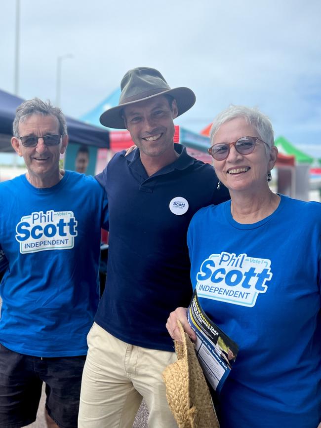 Independent candidate for Solomon Phil Scott with volunteers at an early voting centre in Darwin. Picture: Fia Walsh