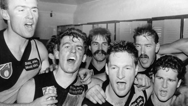 Richmond players celebrate after a win in 1990. But there wasn’t much to celebrate about financially down at Tigerland. Picture: George Salpigtidis