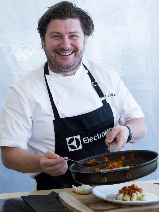 Chef Scott Pickett plating up his prawn bolognese with gnocchi.