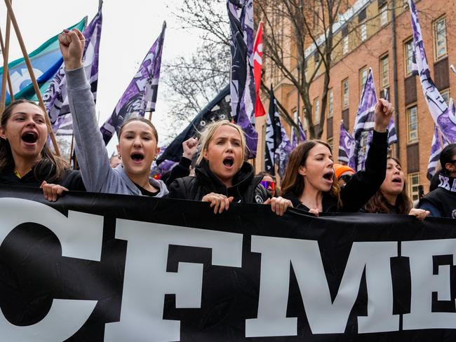 MELBOURNE, AUSTRALIA - AUGUST 27: CFMEU members march shouting slogans on August 27, 2024 in Melbourne, Australia. Thousands of union members across Victoria participated in a march on Tuesday morning to show solidarity with the Construction, Forestry, Maritime, Mining and Energy Union (CFMEU). The strikes come in response to new legislation that forces the CFMEU to accept administration following allegations of criminal links and corruption. The new legislation, which passed the Senate with support from the Opposition, gives the relevant minister the power to appoint an administrator. The CFMEU has criticized the law, saying it stripped members of the right to a fair process and has flagged a legal fight. Prime Minister Anthony Albanese dismissed the union's criticism, stating that it is "business as usual from the CFMEU". (Photo by Asanka Ratnayake/Getty Images)