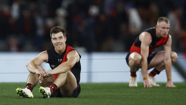 Bombers Zach Merrett and Nick Hind after the final siren. Picture: Daniel Pockett/Getty Images