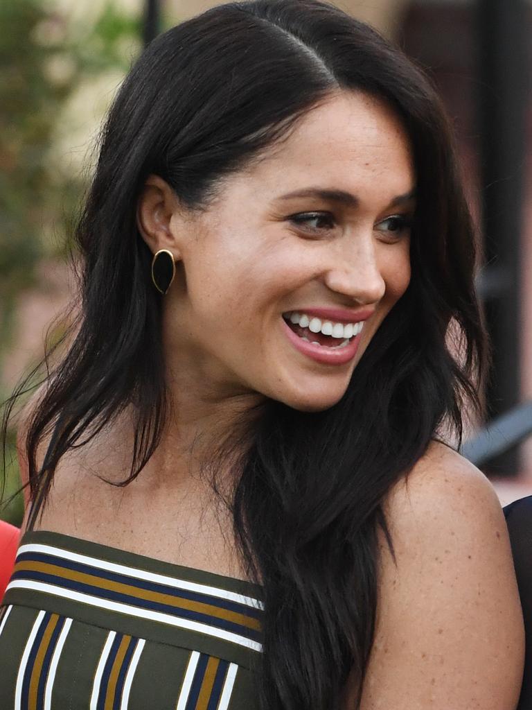 Meghan looked stunning in the eye-catching dress. Picture: Facundo Arrizabalaga — Pool/Getty Images