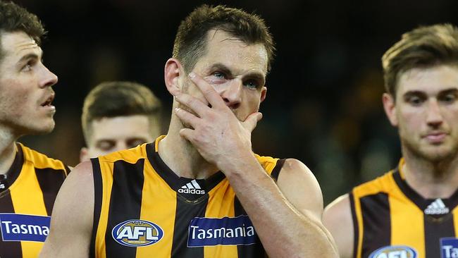 Luke Hodge walks from the MCG. Picture: George Salpigtidis