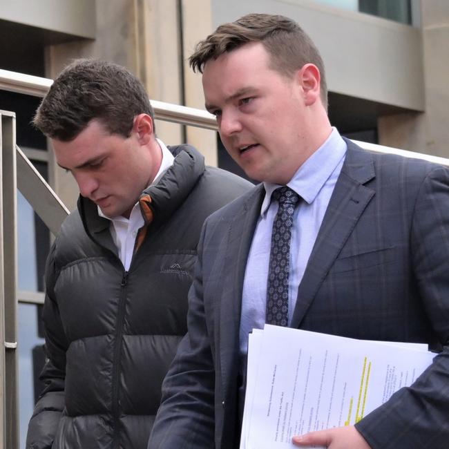 Kobe Brenden McCauley (left) with his defence lawyer. Picture: Kenji Sato