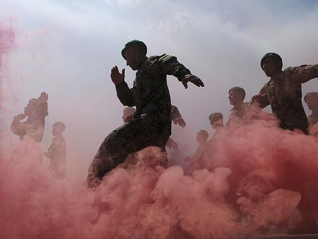 Afghan National Army (ANA) officers march during a graduation ceremony at the Ghazi Military Training Centre in Kabul. Picture: AFP/Shah Marai