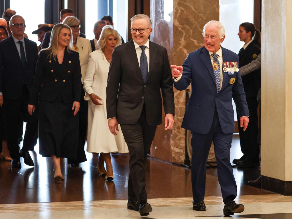 King Charles waves beside Prime Minister Anthony Albanese as they enter Parliament House. Picture: NewsWire/David Gray