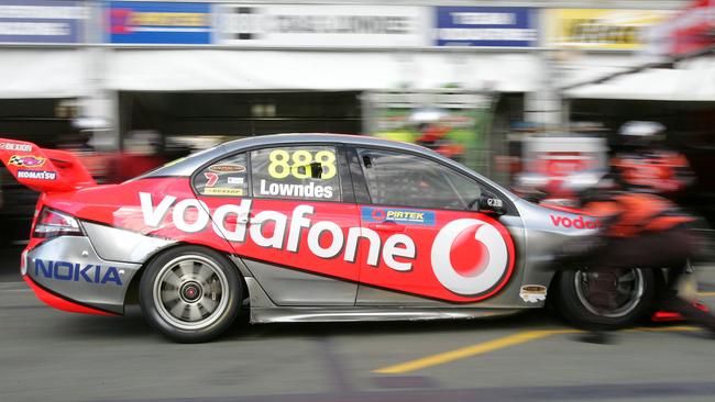 Craig Lowndes enters the pits at SuperGP.