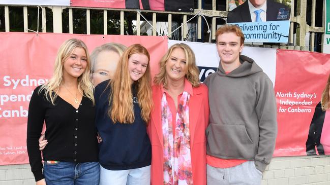 Independent candidate for North Sydney Kylea Tink pictured with her three children at a polling booth today.