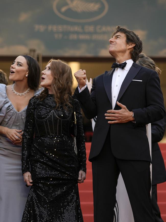 The cast watched on in awe from below. Picture: AP Photo/Petros Giannakouris, File