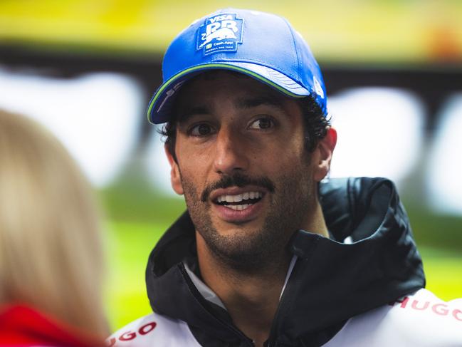 SPA, BELGIUM - JULY 27: 13th placed qualifier Daniel Ricciardo of Australia and Visa Cash App RB talks to the media during qualifying ahead of the F1 Grand Prix of Belgium at Circuit de Spa-Francorchamps on July 27, 2024 in Spa, Belgium. (Photo by Rudy Carezzevoli/Getty Images)