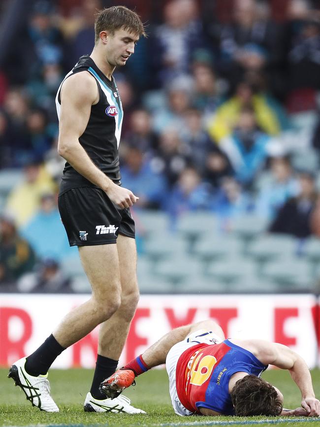 Former Port Adelaide player Dougal Howard takes down Lachie Neale off the ball in last year’s match, when the Power decided to “terrorise” the star. Picture: Daniel Pockett/Getty Images