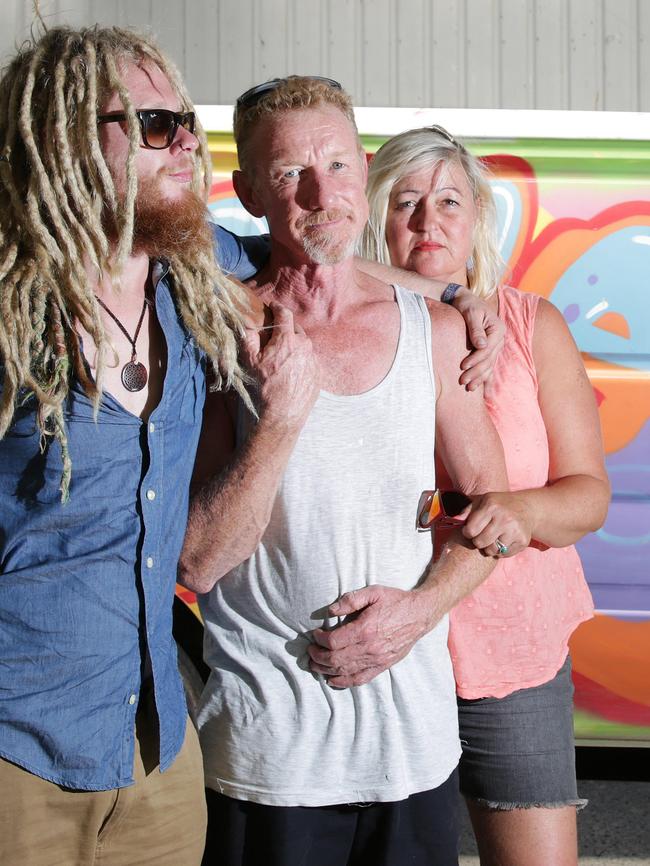 Jayden with his parents, devastated after Lachie’s van was stolen and trashed.