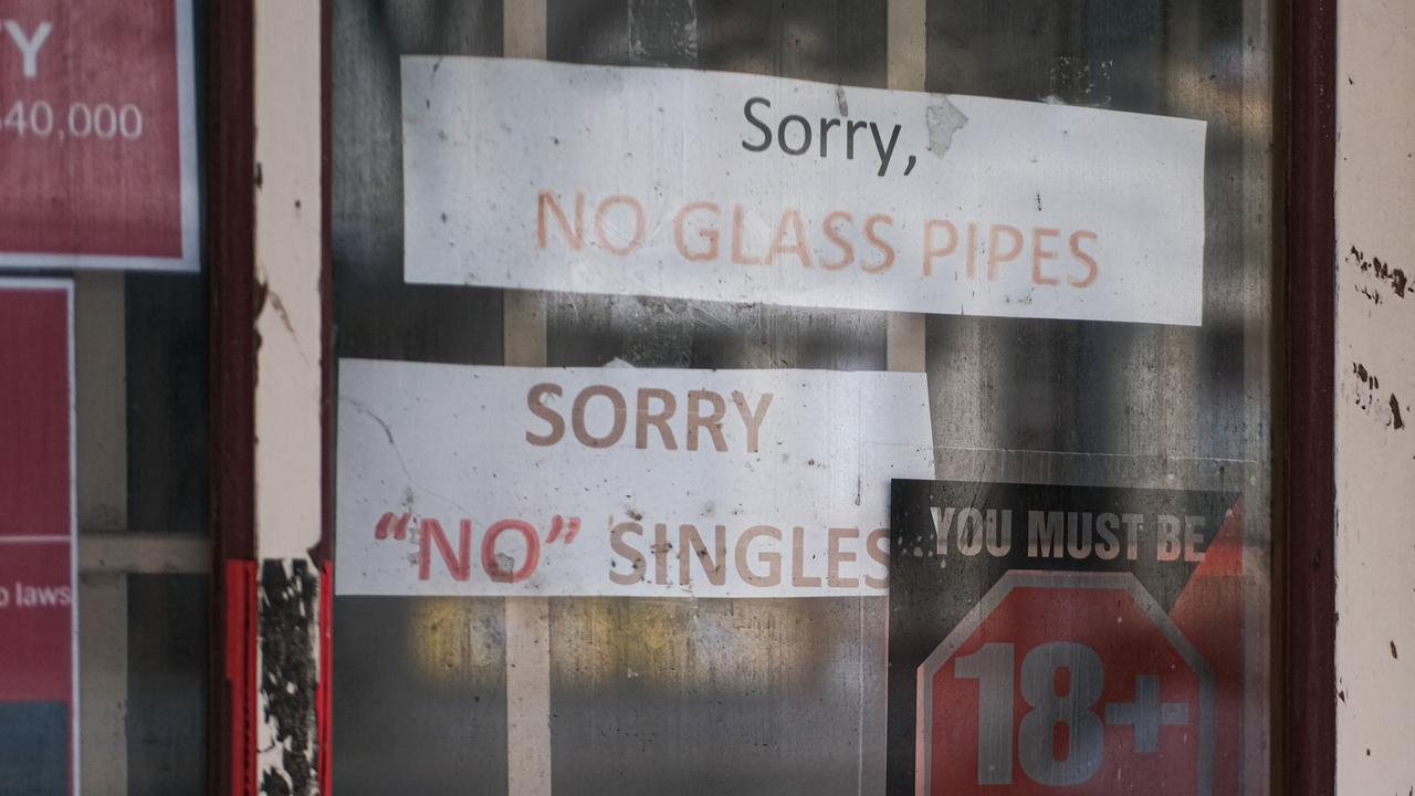 The signs on the dirty window of a CBD tobacconist. Picture: Shaun Viljoen