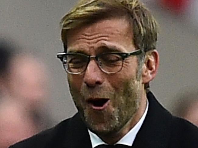 Liverpool's German manager Jurgen Klopp gestures on the touchline during the English League Cup final football match between Liverpool and Manchester City at Wembley Stadium in London on February 28, 2016. / AFP / Ben STANSALL / RESTRICTED TO EDITORIAL USE. No use with unauthorized audio, video, data, fixture lists, club/league logos or 'live' services. Online in-match use limited to 75 images, no video emulation. No use in betting, games or single club/league/player publications. /