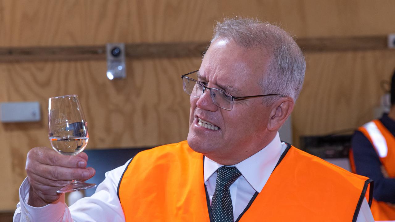 Prime Minister Scott Morrison checks out the whisky at Lark Distillery in Hobart on Friday. Picture: Jason Edwards