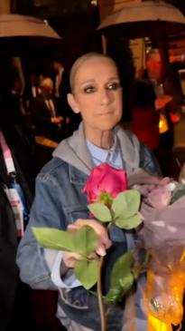 Touching moment fan gifts Celine Dion a rose after Olympics performance