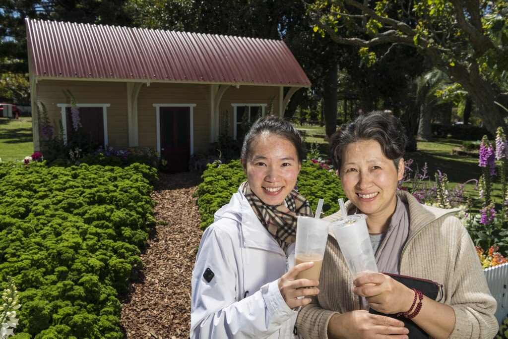 Friends Hanyu Wang (left) and Angela Wang in Laurel Bank Park during Carnival of Flowers 2020, Saturday, September 26, 2020. Picture: Kevin Farmer