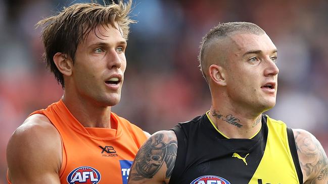 SYDNEY, AUSTRALIA - APRIL 06: Matt de Boer of the Giants and Dustin Martin of the Tigers jostle each other off the ball during the round three AFL match between the Greater Western Sydney Giants and the Richmond Tigers at GIANTS Stadium on April 06, 2019 in Sydney, Australia. (Photo by Mark Kolbe/Getty Images)