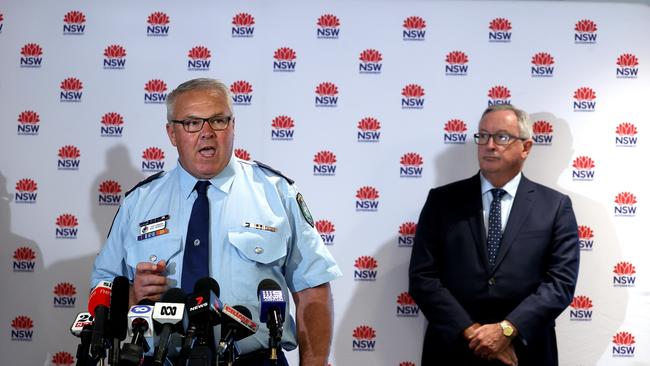 NSW Police Deputy Commissioner Gary Worboys and NSW Health Minister Brad Hazzard (right) at a press conference on Thursday. Picture: Dylan Coker