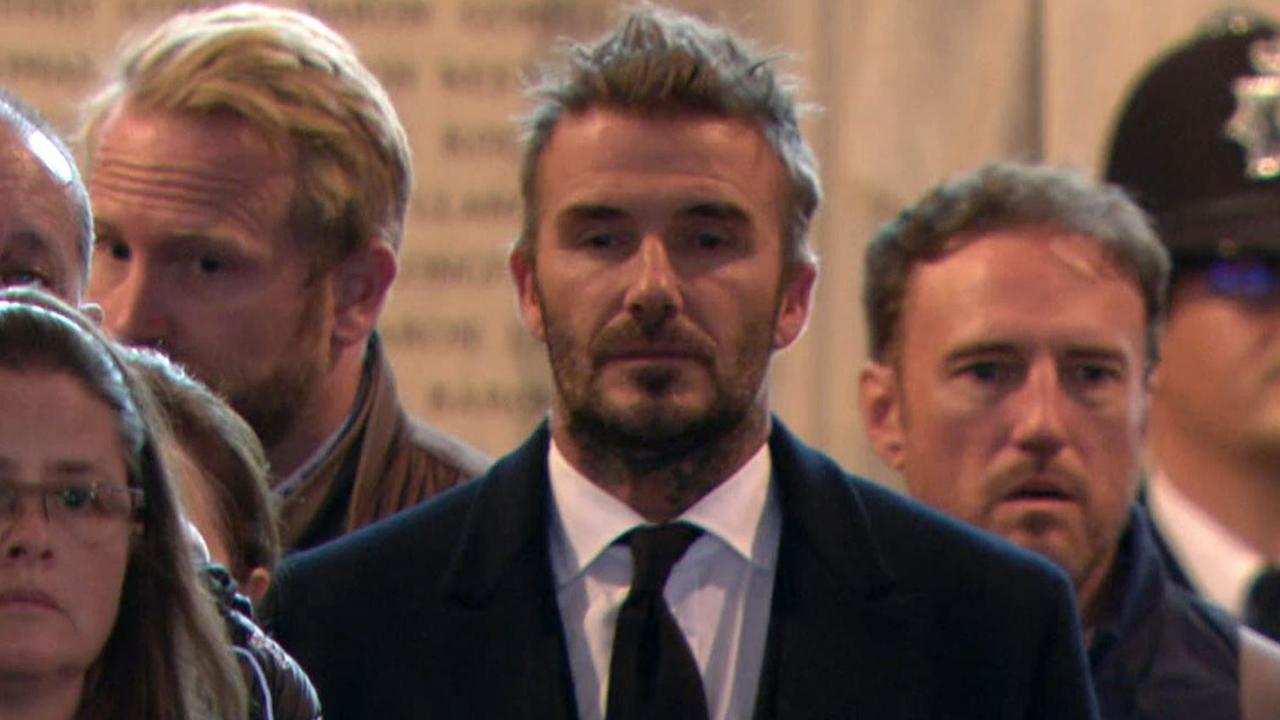 Beckham wiped away a tear after entering Westminster Hall. Picture: Sky News