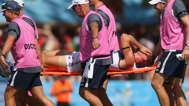SHEPPARTON, AUSTRALIA - MARCH 05: Jackson Thurlow of the Cats reacts after getting carried off with a leg injury during the 2016 AFL NAB Challenge match between the Essendon Bombers and the Geelong Cats at Deakin Resserve on March 5, 2016 in Shepparton, Australia. (Photo by Michael Dodge/Getty Images)