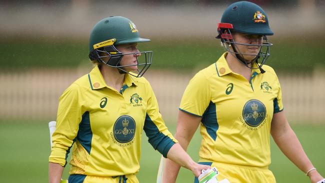 SYDNEY, AUSTRALIA - JANUARY 09: Alyssa Healy of Australia and Georgia Voll of Australia walk from the field as rain delays the match during the One Day match between Governor General's XI and England Women at North Sydney Oval, on January 09, 2025, in Sydney, Australia. (Photo by Brett Hemmings/Getty Images)