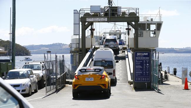 Cars are driven onboard one of the three Bruny Island ferries on Thursday. Picture: MATT THOMPSON