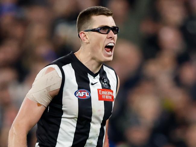 MELBOURNE, AUSTRALIA - SEPTEMBER 22: Mason Cox of the Magpies celebrates a goal during the 2023 AFL First Preliminary Final match between the Collingwood Magpies and the GWS GIANTS at Melbourne Cricket Ground on September 22, 2023 in Melbourne, Australia. (Photo by Dylan Burns/AFL Photos via Getty Images)