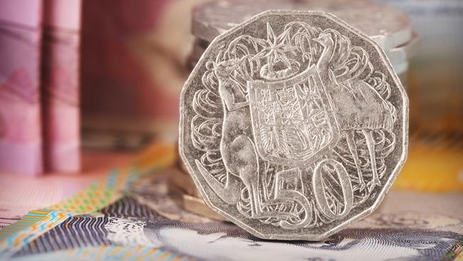 Question 16: This is what a 50c coin looks like now, but what did it look like when it was introduced in 1966? Picture: Getty