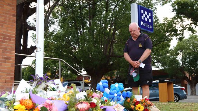 Locals have turned out to pay their respects to fallen police officers Constable Rachel McCrow and Constable Matthew Arnold. Picture: David Clark / NCA NewsWire