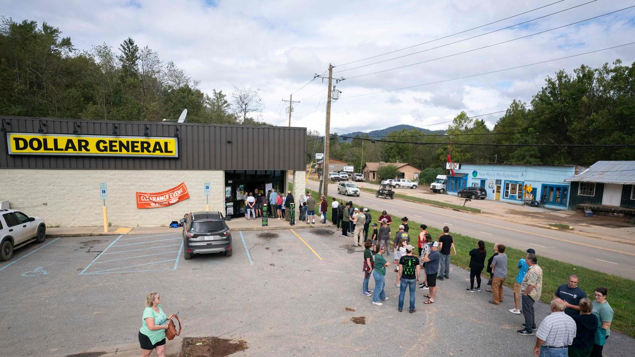 People wait in line at Dollar General in the aftermath of Hurricane Helene in Fairview, North Carolina. Picture: Sean Rayford/Getty Images/AFP