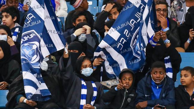 Female supporters of cheer Al-Hilal: the first time Saudi Arabia allowed women to enter a football stadium to watch a match. Picture: AFP
