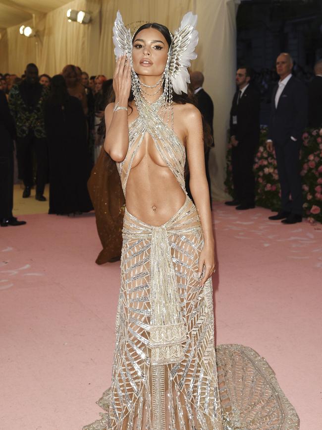 Emily Ratajkowski paid tribute to Cher in this naked dress. Picture: AP