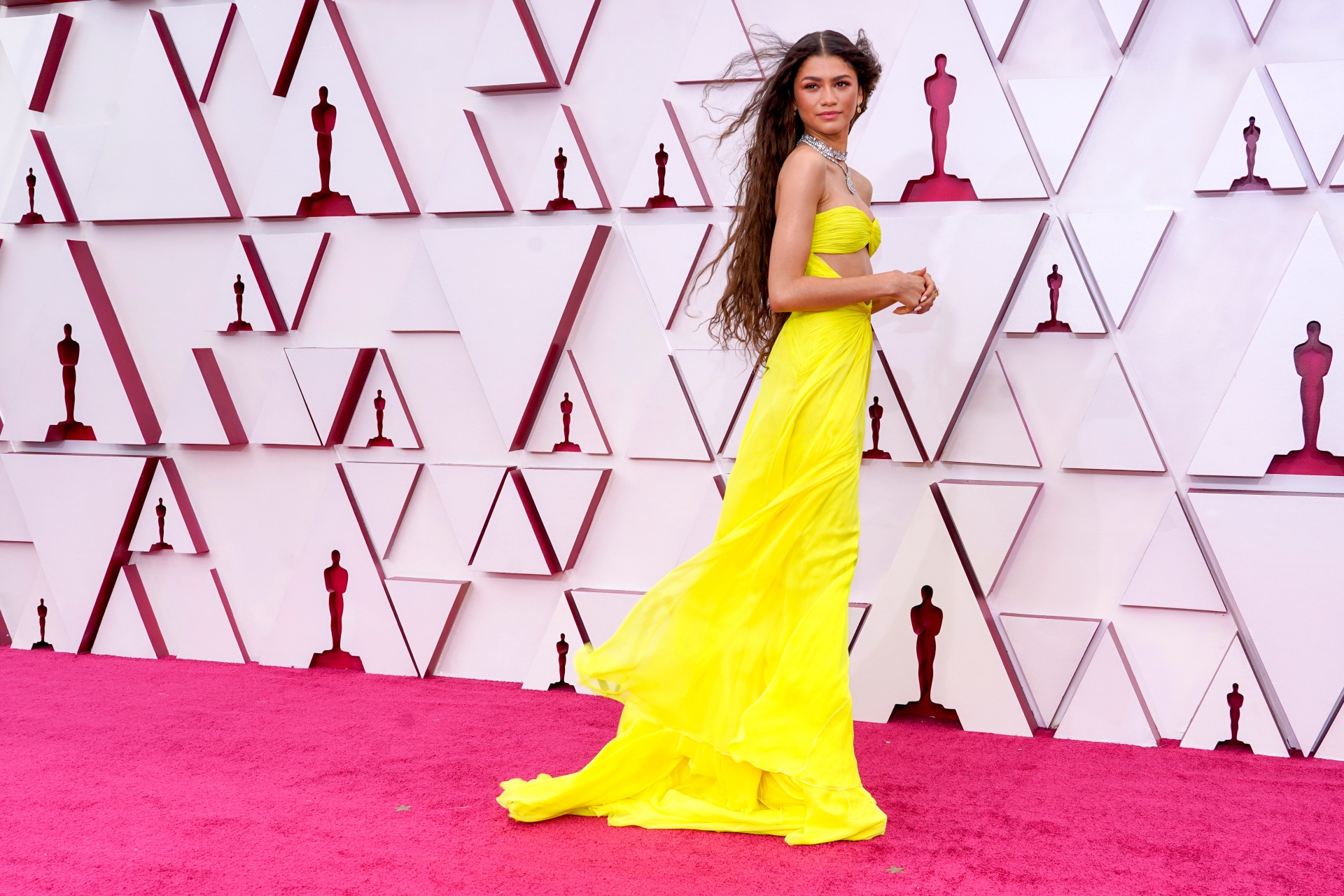 <p><strong>Zendaya in custom Valentino (2021)</strong></p><p>As much as Zendaya&rsquo;s custom Valentino look at the 2021 Oscars was authentic to her own style, the <em>Dune</em> actress was actually channelling another multi-talented hyphenate from a different era. Taking to social media, the star's stylist, Law Roach, revealed the look was an homage to none other than Cher, whose ab-baring gowns were famously commonplace on her 1970s TV series <em>The Sonny &amp; Cher Show</em>.&nbsp;</p><p>Roach shared a photo of a near-identical one of Cher's looks on <a href="https://www.instagram.com/p/CAbPoL3DL6M/?hl=en" target="_blank" rel="noopener">Instagram</a> (albeit with the neck-tie replaced by Bulgari jewels in Zendaya's case), and with the caption: "Constant inspiration."</p>